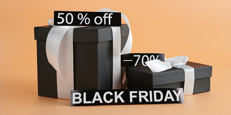 video-marketing-sale Two black gift boxes on an orange background advertise a Black Friday sale