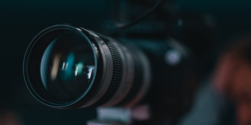 working-with-clients-camera Close up of a cinematic camera lens